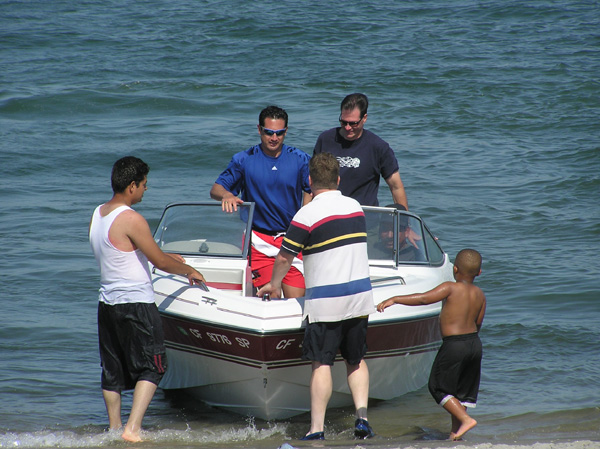 Ray Vinole and Andrew Taylor on boat